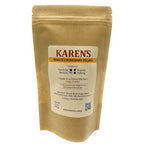 Kraft paper packaging of KARENS Roasted Rosemary Pecans with a label on a white background