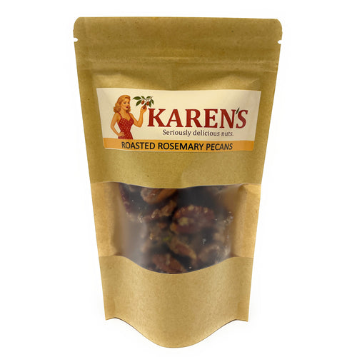 Kraft paper bag of KARENS roasted rosemary pecans on a white background